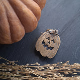 Brass Haunted Great Pumpkin Pendant: Traditional Grin